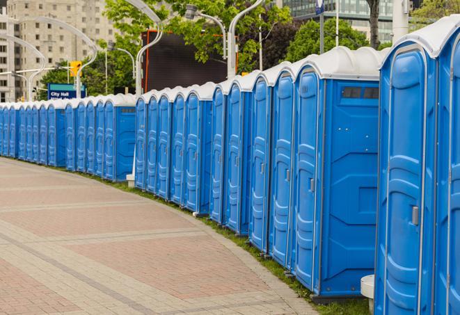 a row of portable restrooms at a fairground, offering visitors a clean and hassle-free experience in Oakland